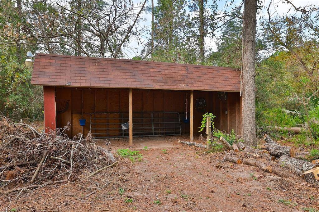 Run in shed toward the back of the property.