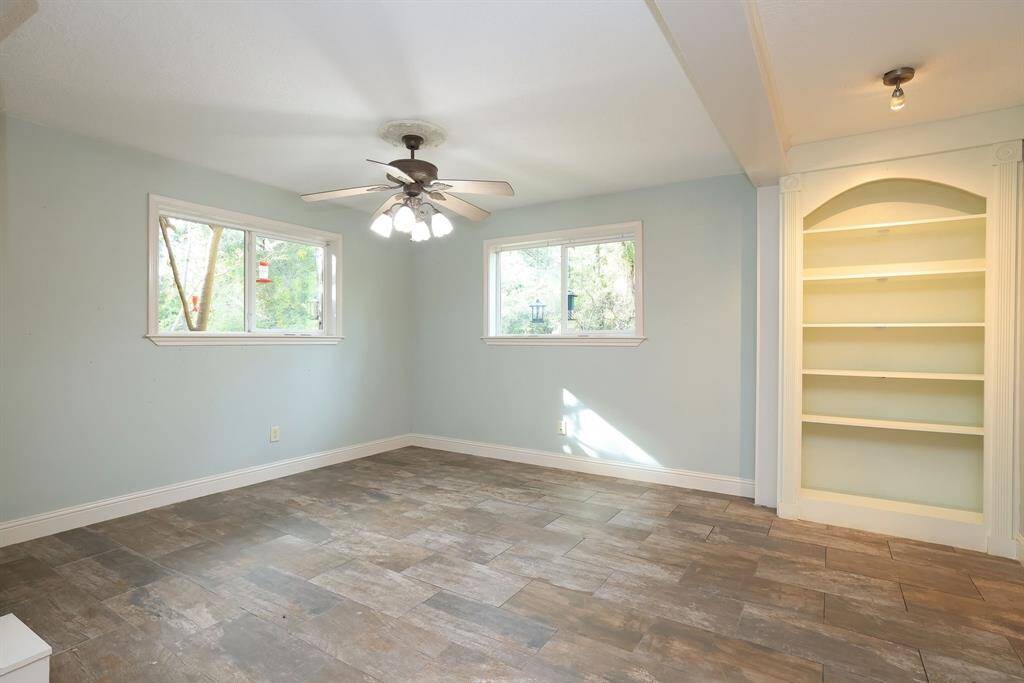 Custom built-in shelving is the perfect place to display your favorite treasures and give this space your special touch.
