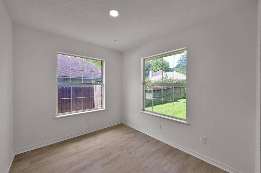 Generously sized Breakfast nook/eat-in kitchen area with LED lights and large windows!