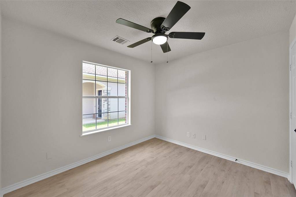 Bedroom #3 is identical to bedroom #2 with the addition of an extra storage closet! This would make an ideal home study/office or additional bedroom.