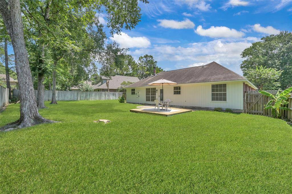 The fully fenced backyard features a stamped concrete patio and new wood deck! The generously sized back yard has mature trees creating a relaxing and peaceful retreat!