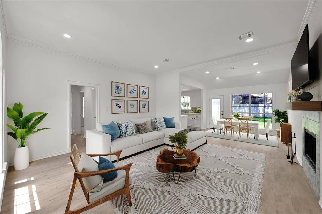 High ceilings and plenty of windows allow natural light to showcase this beautifully remodeled home!