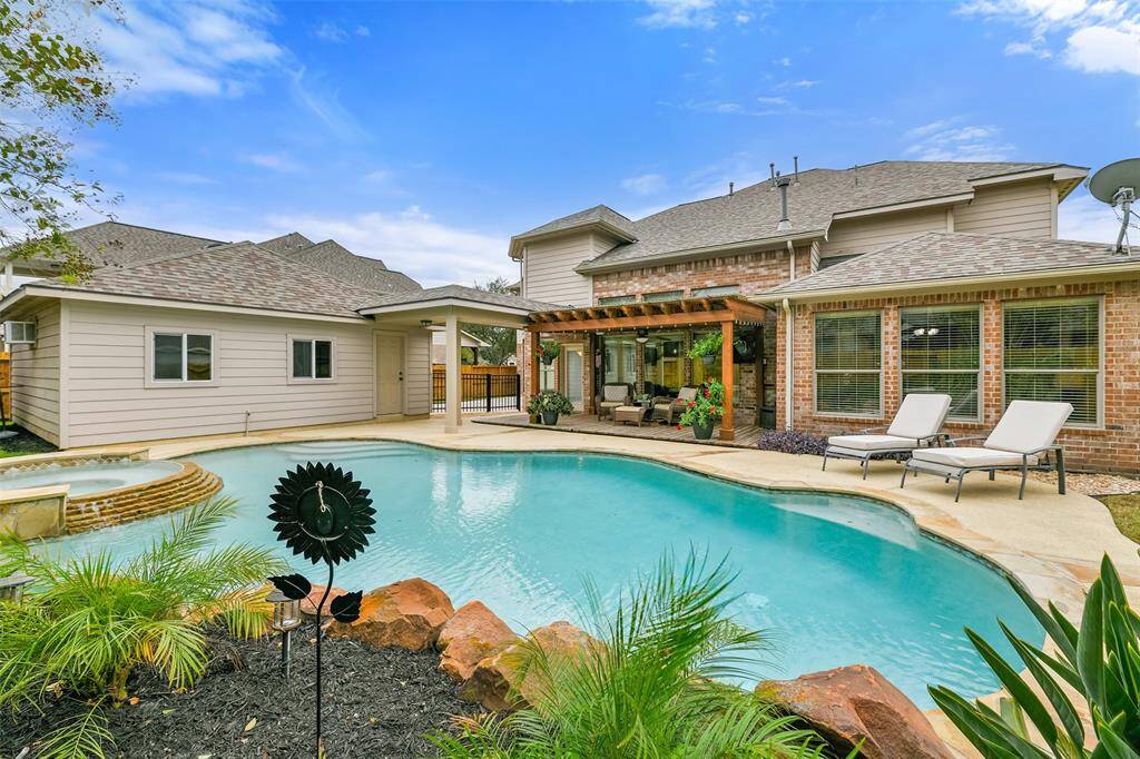 Welcome to 1370 Porta Rosa Lane! This impressive 2-story 4 bedroom home offers 4,154 square feet of beautifully appointed living space and a fabulous backyard paradise, all situated in the master-planned Tuscan Lakes community in League City.