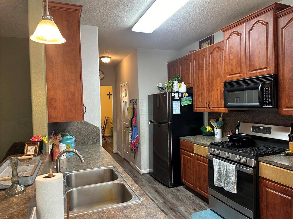 Kitchen is also complete with a pantry and easy access to the formal dining room.