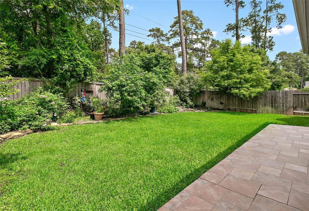 Lush backyard for entertaining or relaxing.
