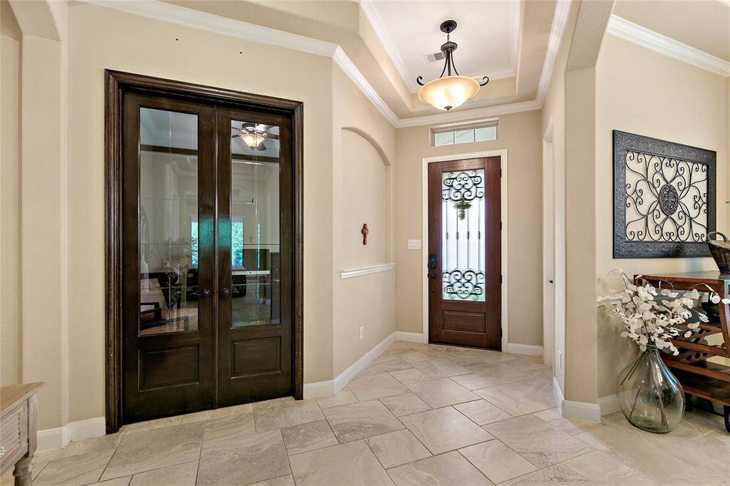Gorgeous woodwork and wood moulding throughout this home.
