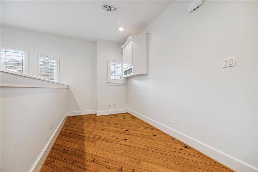 Directly up the stairs is an area that is great for a small office/desk.