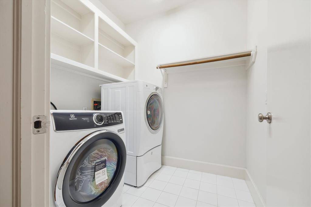 The dedicated laundry room is on the 3rd floor. The washer and dryer will be sold along with the home.