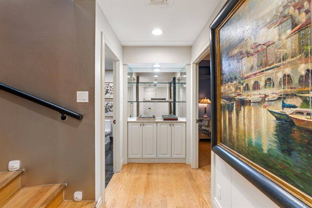 39th floor entry hall with hardwoods and built-in cabinetry.