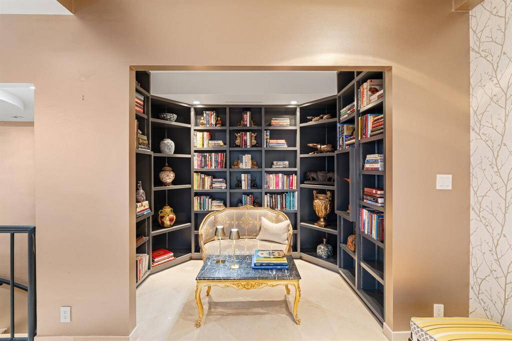 Cozy library alcove with built-in book shelves.