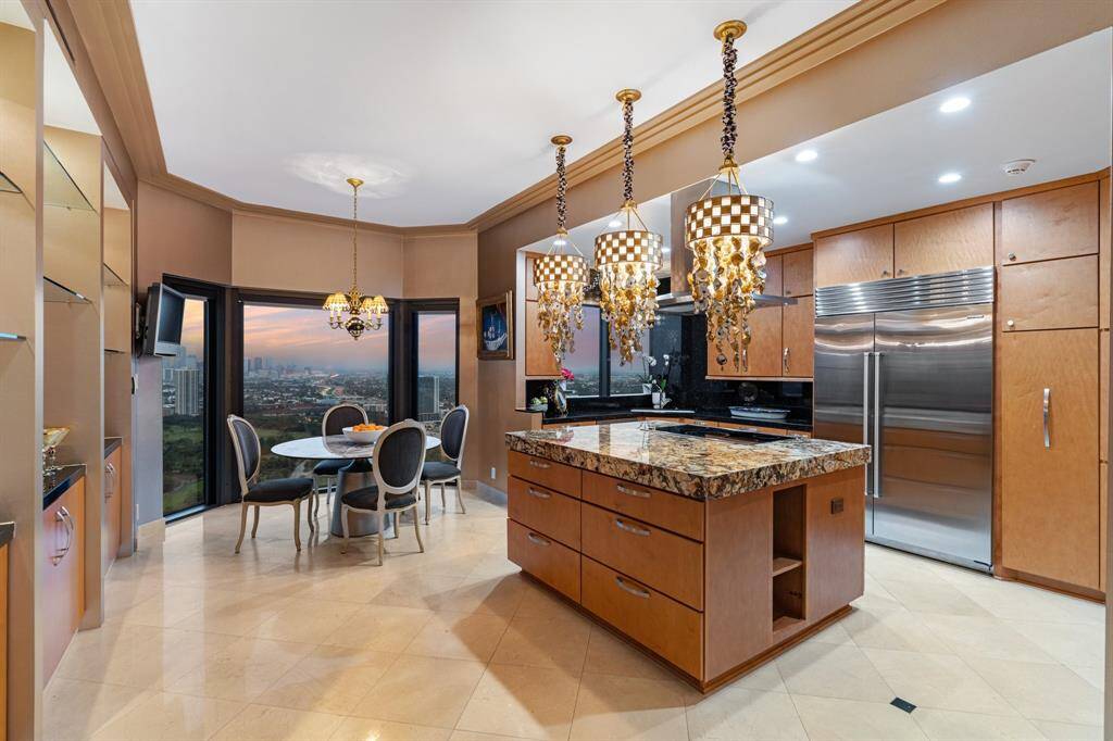 Large island kitchen with breakfast room.