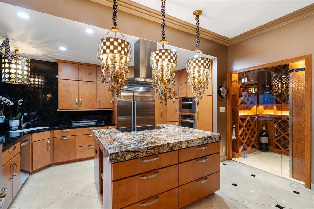 Generous storage, SubZero refrigerator/freezer and a walk-in wine room.