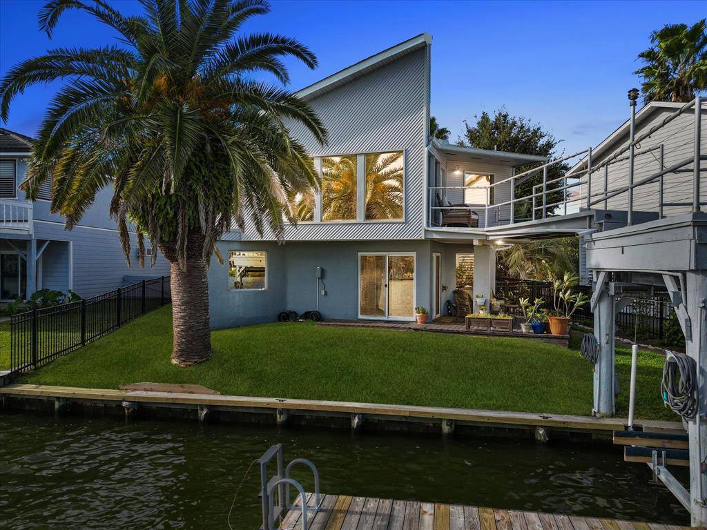 Waterfront Living. Feel like you are on Vacation. Private Path Leading to Your Private Dock, Accentuated by Lush and Mature Landscaping.