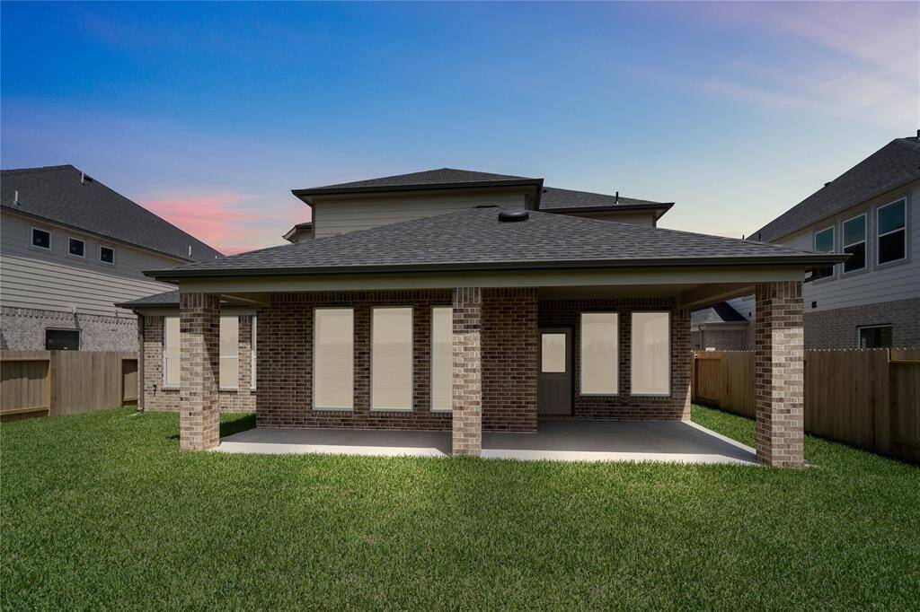 Come and see this spacious backyard with its beautiful covered patio. There is plenty of room for the kids to play and adults to relax! Perfect for your outdoor living space, patio furniture, bbq pit, and so much more. The possibilities are endless!