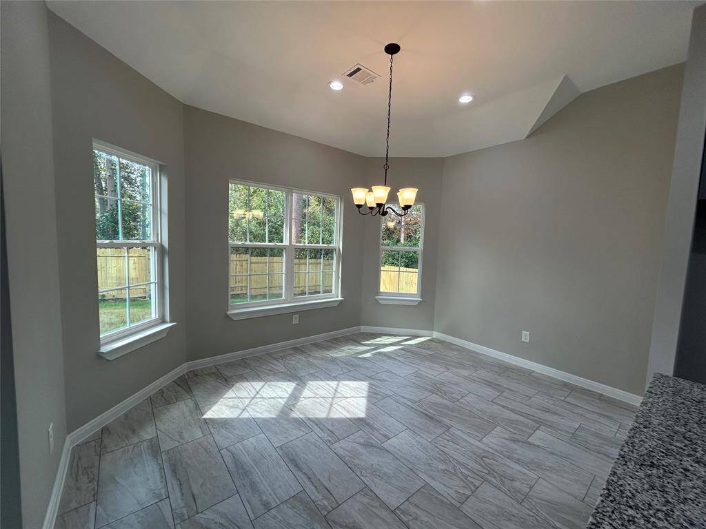 This spacious nook allows for peaceful meals with a view of the beautiful nature that surrounds your home!