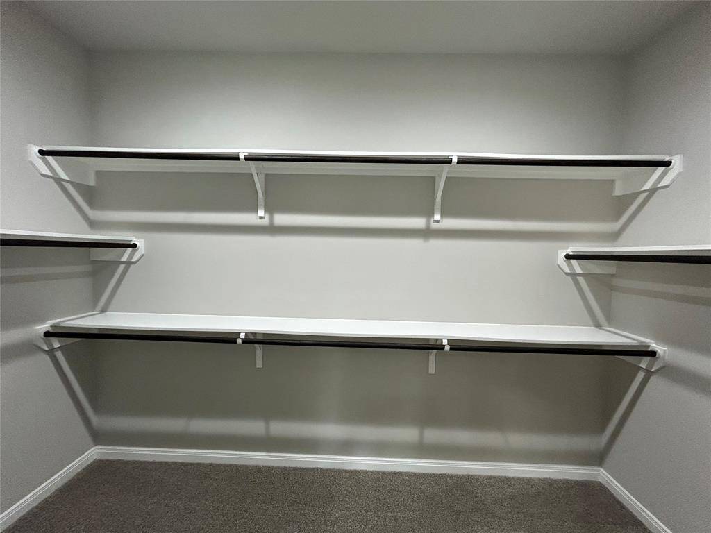 The perfect walk-in closet for plenty of storage!