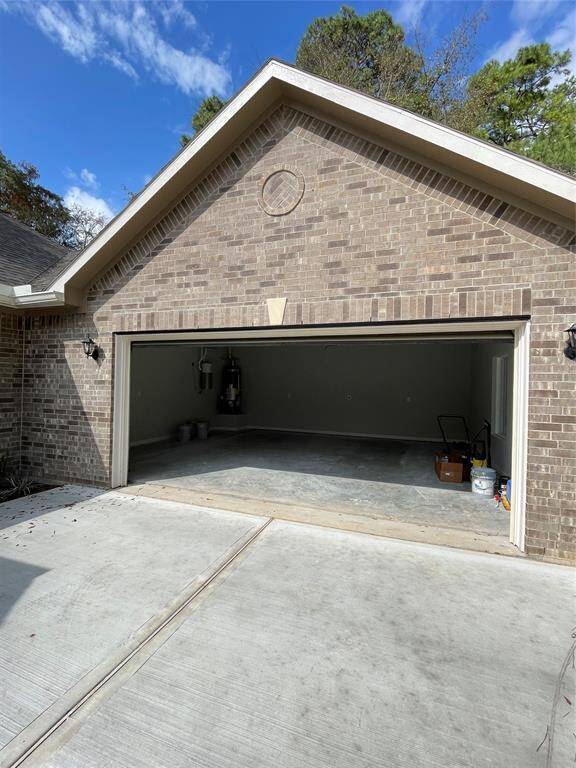 This home has an oversized 2 car garage with an electric vehicle charging port for the eco-friendly homeowner! Easy access to the central vacuum system makes for very easy cleaning!