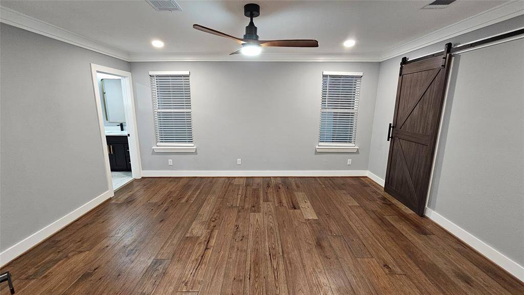 Huge 16x14 Primary Bedroom, Beautiful Engineered Hardwood Floors and Closet with Barn Door