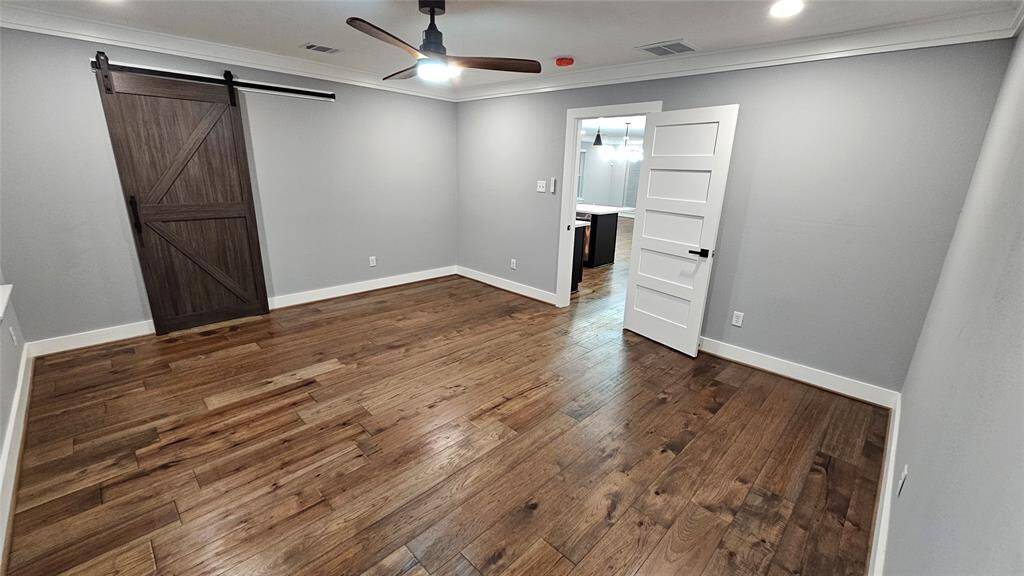 Huge 16x14 Primary Bedroom, Beautiful Engineered Hardwood Floors and Closet with Barn Door