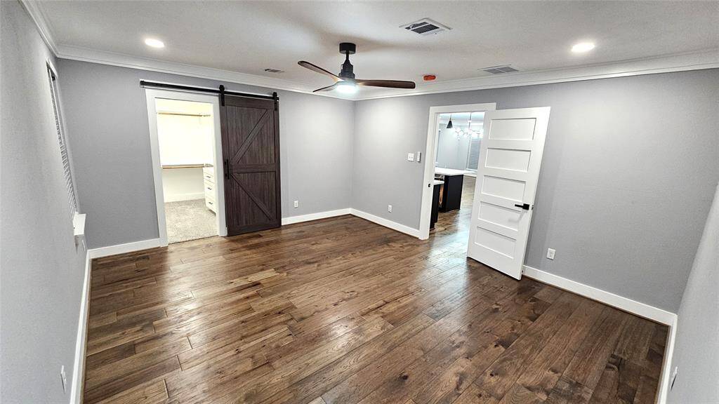 Huge 16x14 Primary Bedroom, Beautiful Engineered Hardwood Floors and Closet with Barn Door