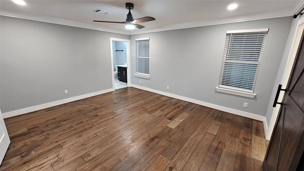 Huge 16x14 Primary Bedroom, Beautiful Engineered Hardwood Floors and Closet with Barn Door