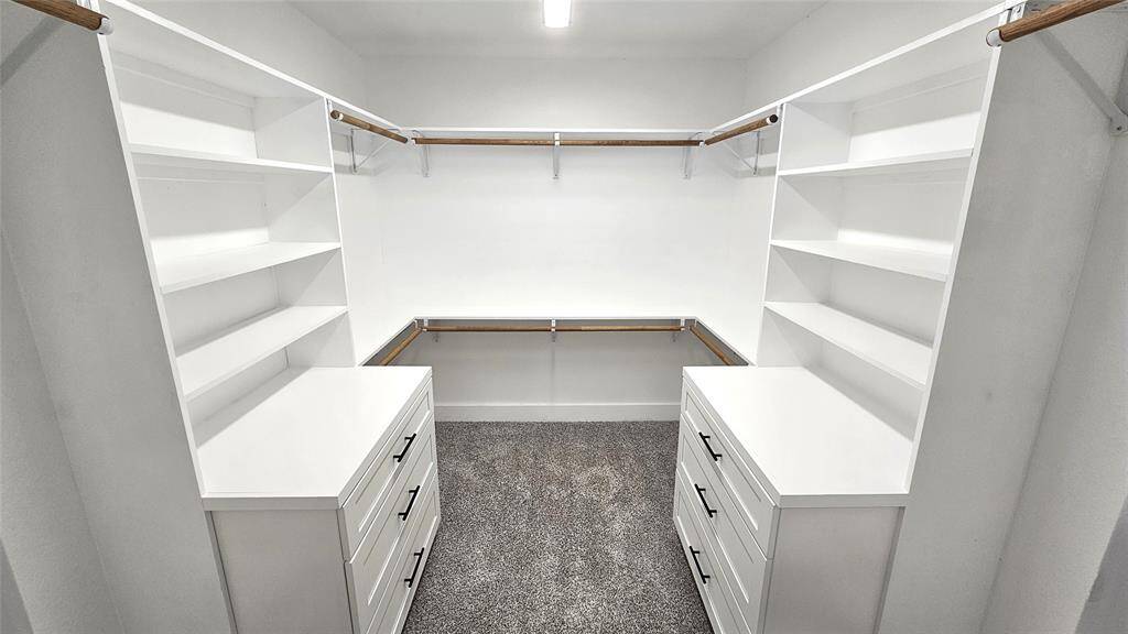 Primary Walk-In Closet with Built-in Cabinets with Soft Close Drawers