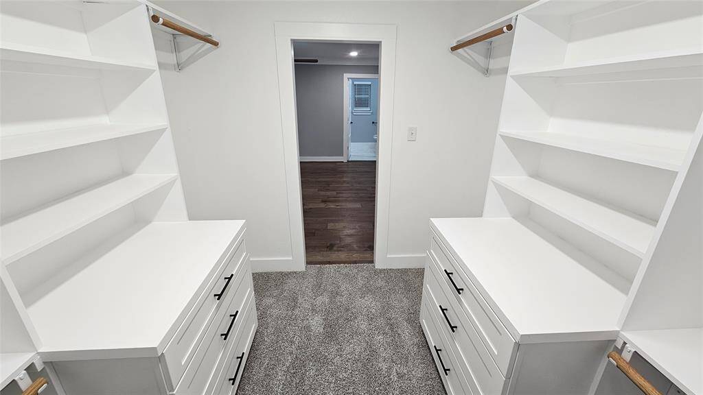 Primary Walk-In Closet with Built-in Cabinets with Soft Close Drawers