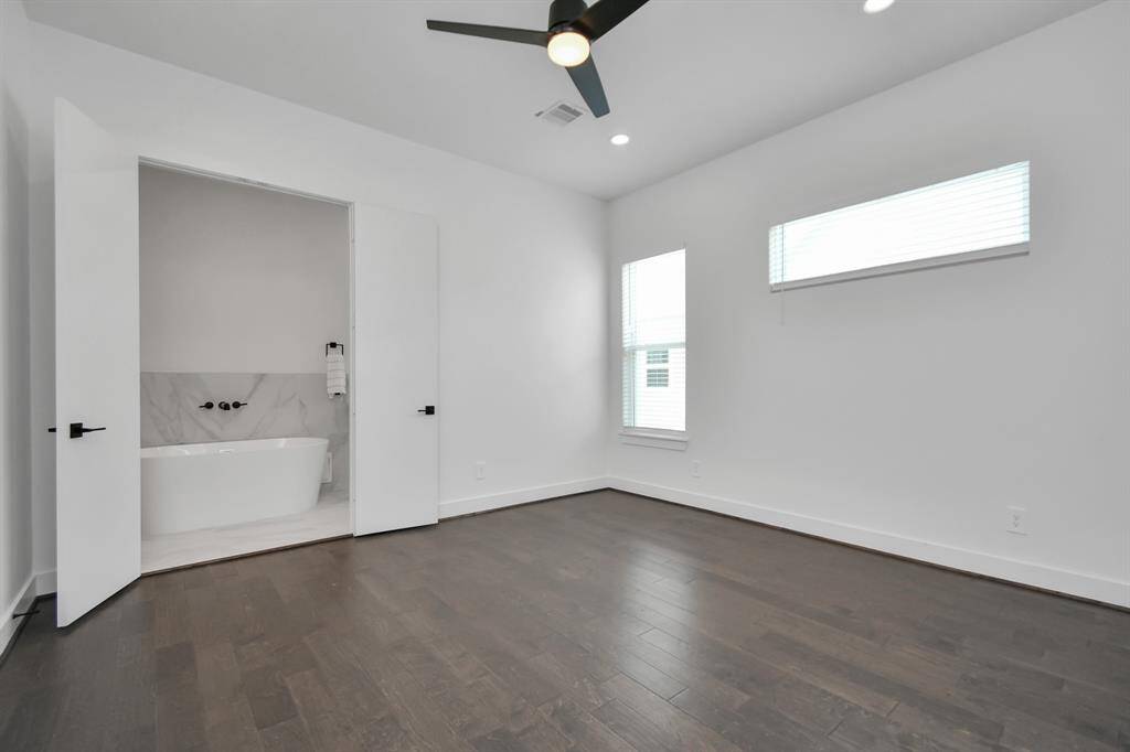 Retreat to luxury in this expansive primary bedroom, flooded with natural light and complemented by a private ensuite oasis for the ultimate in relaxation