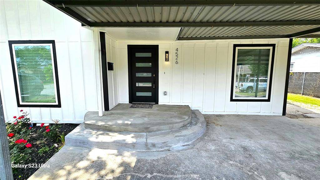 Beautiful Entry with Modern 5 Panel Fiberglass Door, Smart Lockset with Touchscreen Keyless Entry,  Board & Batten Hardie Siding and LED Lighting