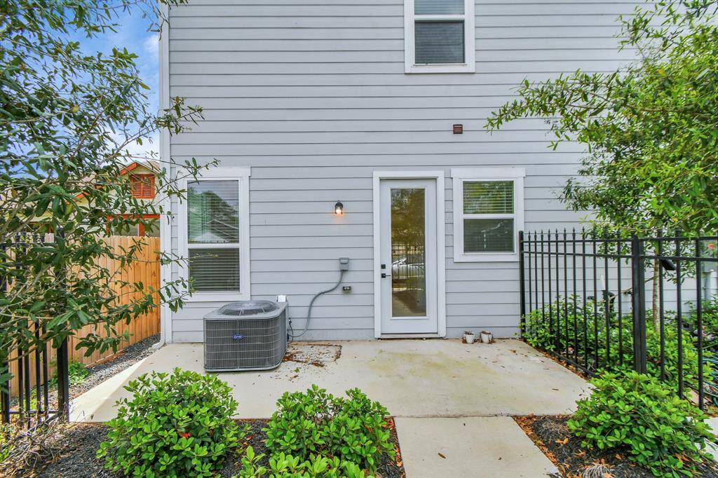 Embrace outdoor living in this backyard space, perfect for soaking fresh air, entertaining, gardening, or simply unwinding in nature's embrace.