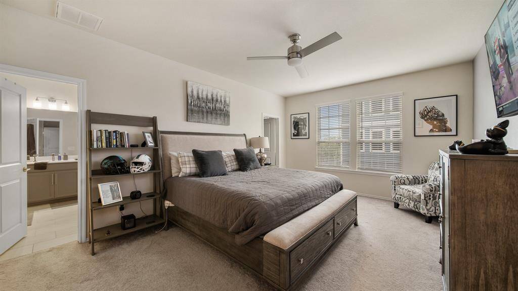 Step into the sanctuary of theprimary bedroom. Soft carpetingunderfoot adds a touch of luxury,creating a warm and invitingatmosphere that extends throughoutthe space.