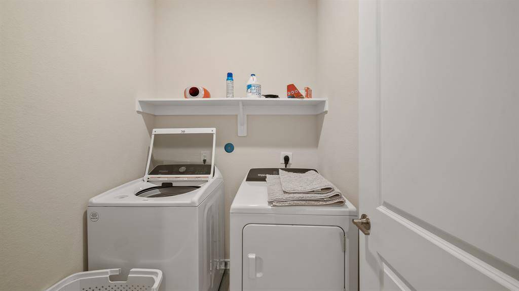 The laundry room featureswasher and dryer connections, andplenty of storage space.