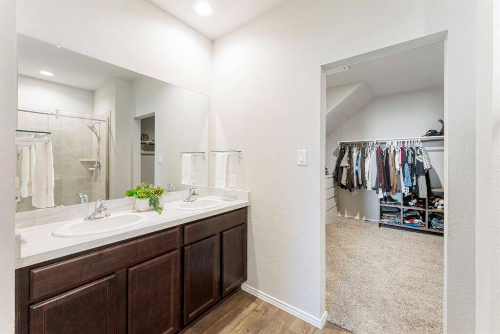 Double vanity sinks make getting ready in the morning convenient.