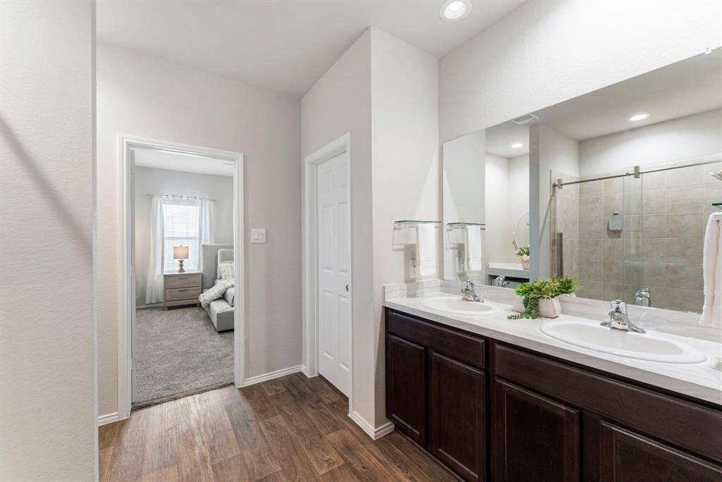 The added door to the toilet space provides extra privacy and enhances the overall functionality of the bathroom.