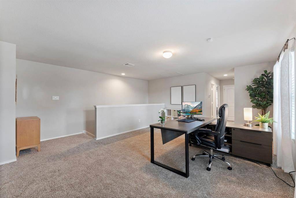 The spacious upstairs game room is perfect for family fun and entertainment!