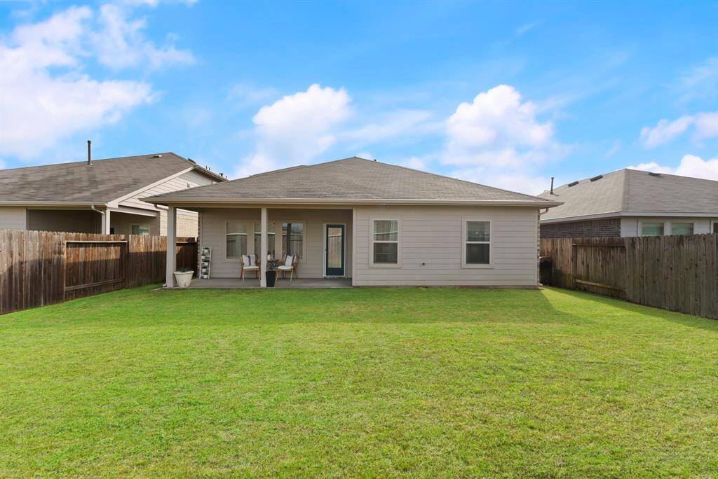 You’ll create countless memories in this awesome backyard—perfect for gatherings, play, and relaxation!