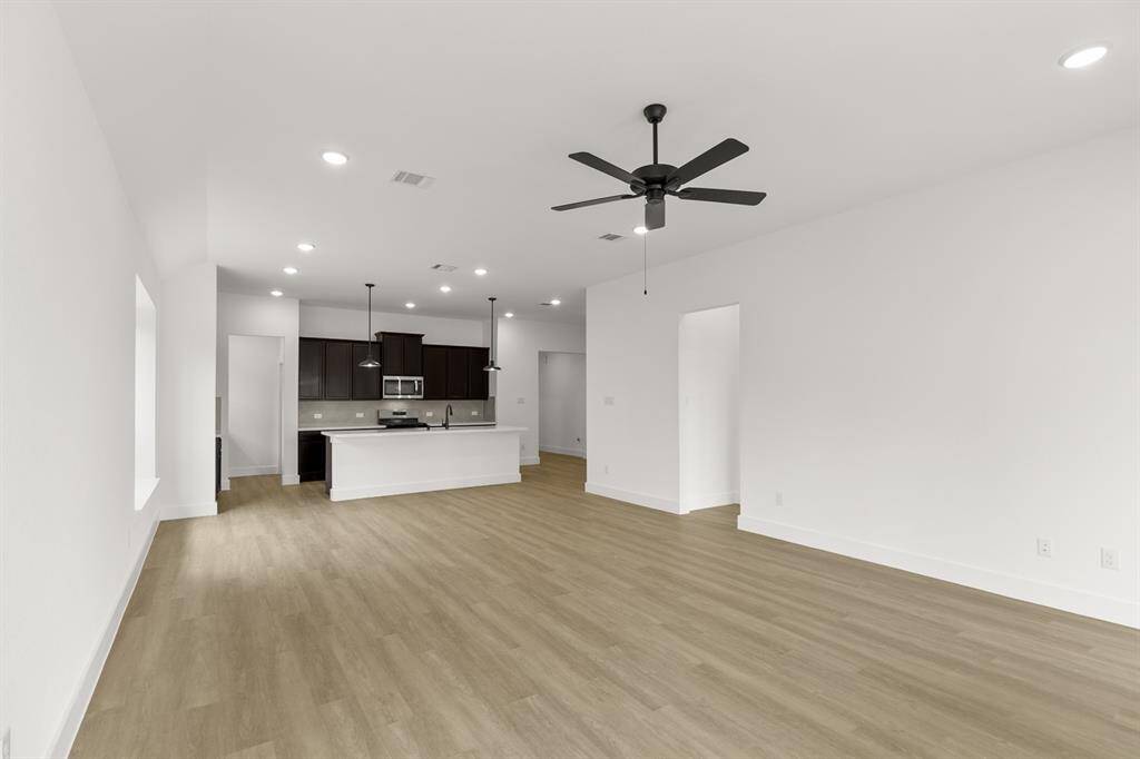 The open layout invites laughter and warmth, making it the perfect backdrop for family gat