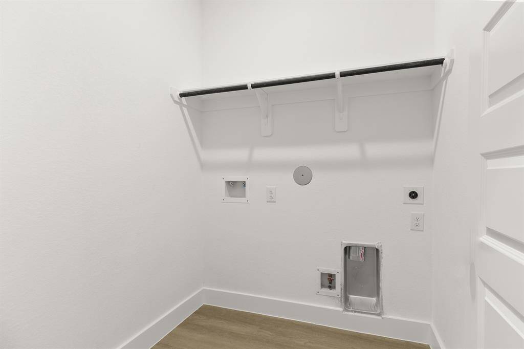 This bright utility room makes even the most mundane chores feel a little more pleasant
