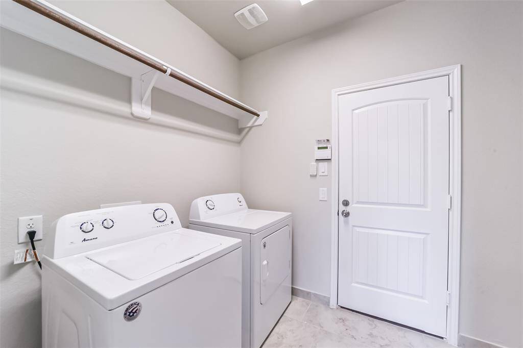 Extra large laundry room and room for freezer too