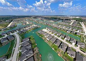 Waterfront living at its best. Large fountains heard from back patio.