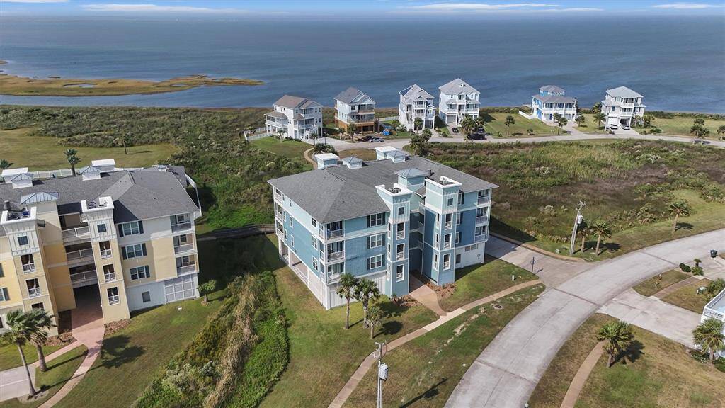 Enjoy breathtaking views of Galveston's serene West Bay from this spacious 3-bedroom, 3-bathroom condo in Pointe West, perfect for relaxation and coastal living.