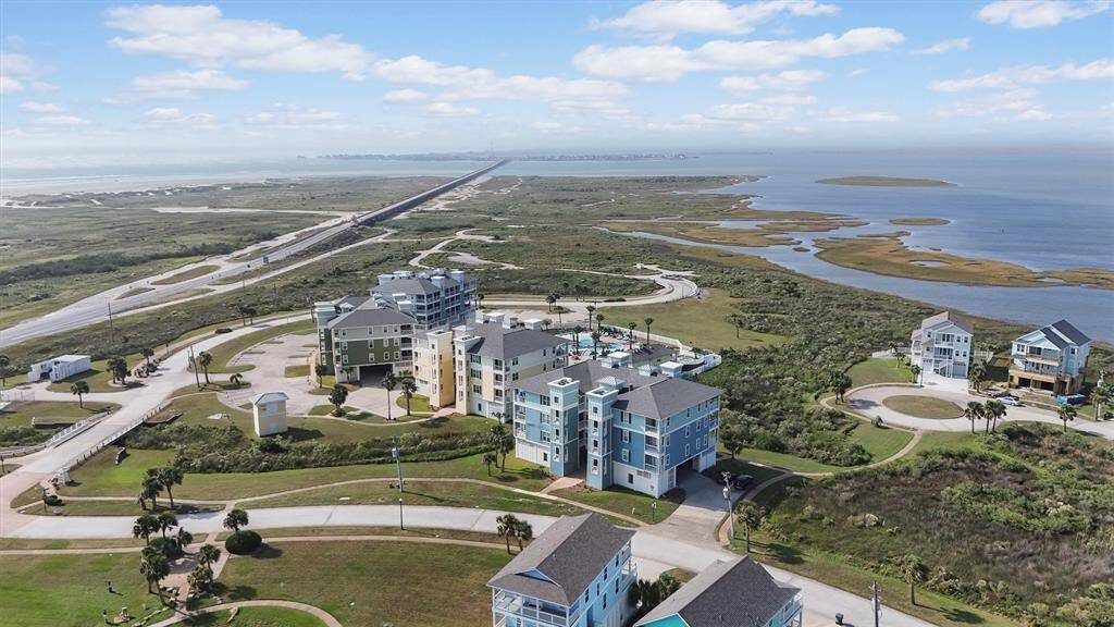 Nestled in a quiet corner of Pointe West, this 1,717 sq ft condo offers a unique vantage point of the surrounding wildlife preserve and expansive bay area.
