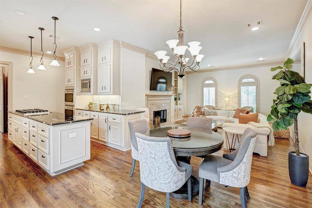 Another view of the breakfast room and family room, kitchen.