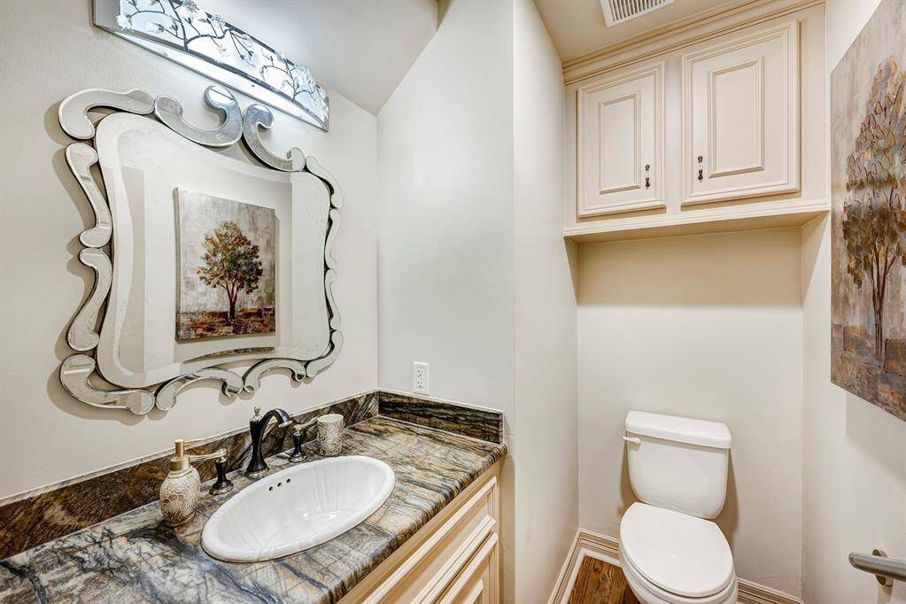 Powder room downstairs is in entry.