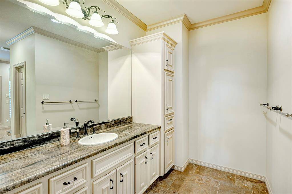 His area. Laundry hamper and linen closet.