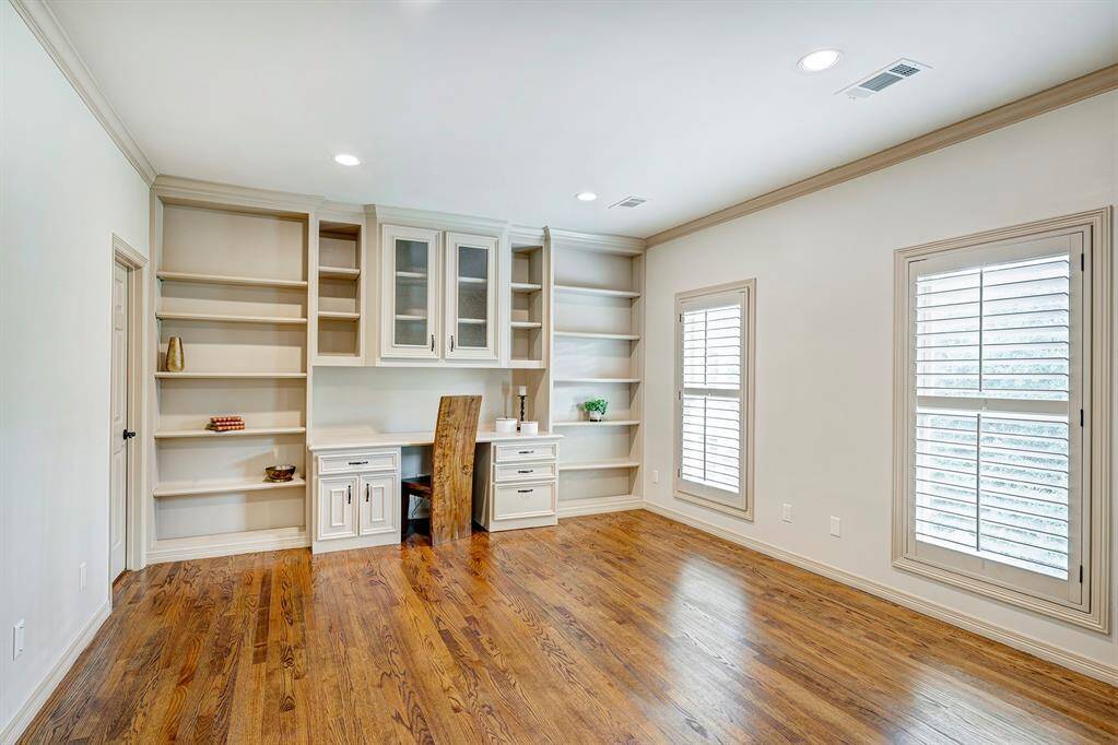 When you come up the stairs to the 2nd floor this is the first bedroom you see. It can be an office or a bedroom. Has a private bath.
