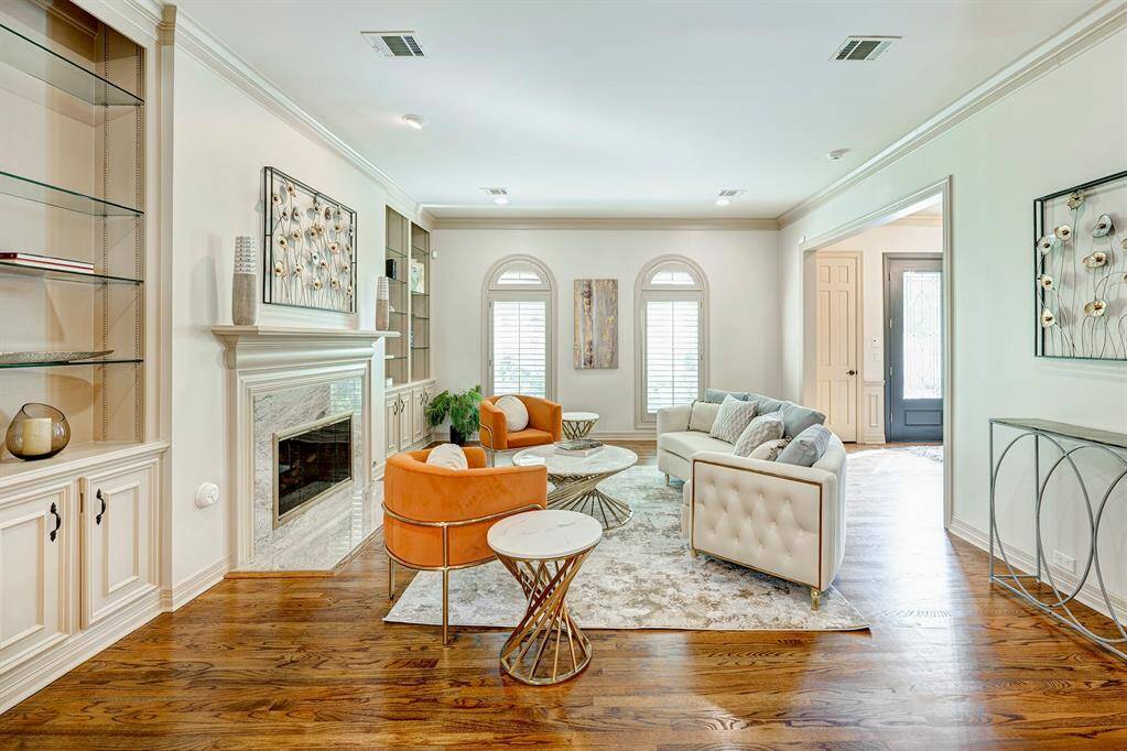 Other view of Living room shows off the arched windows with transoms.