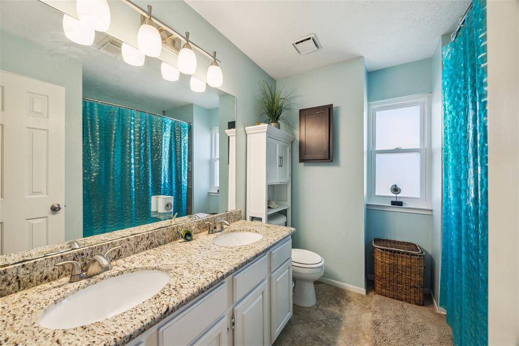 Upstairs Bathroom with double sinks.