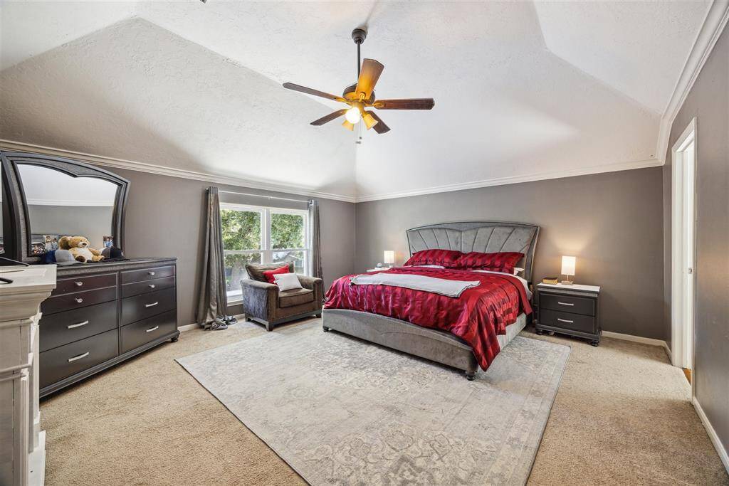 Large primary Bedroom with high ceilings and ensuite bath.