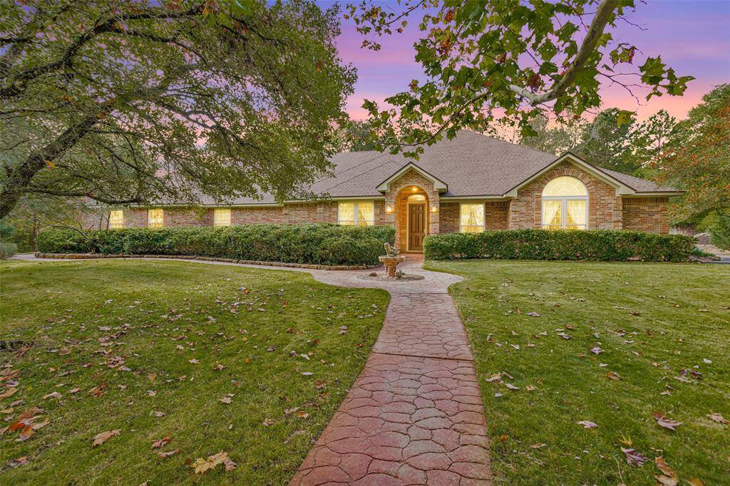 Welcome to this beautiful 3-bedroom, 4-bathroom home in the desirable Grand Lake Estates of Montgomery, Texas. This property is a perfect blend of luxury and comfort, ideal for those who love nature and custom amenities.